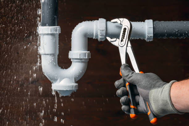 Professional Emergency Plumber technician working in Harwood, MD